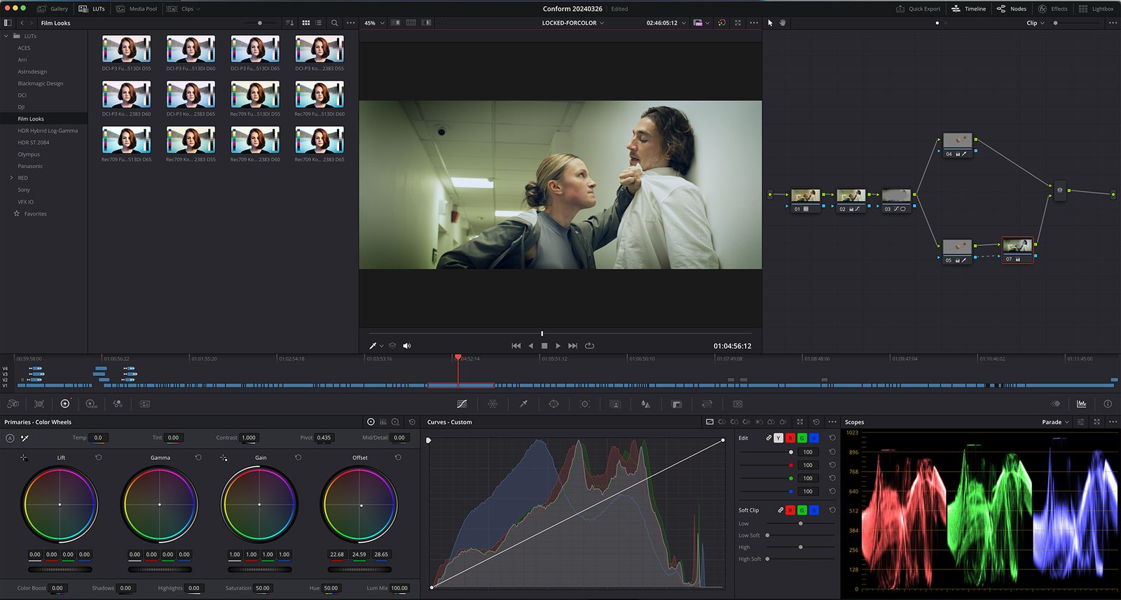 A colour grade in DaVinci Resolve, with node tree, colour wheels and RGB parade